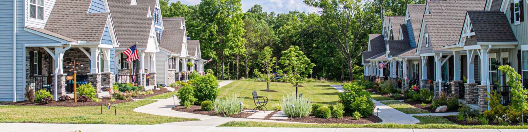 Craftsman-style homes facing a shared courtyard green